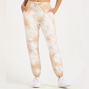 Vuori Tie-Dye Track Joggers in Beige and White